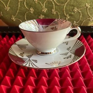 ANTIQUE BAREUTHER MAROON AND GOLD DEMITASSE TEACUP AND SAUCER